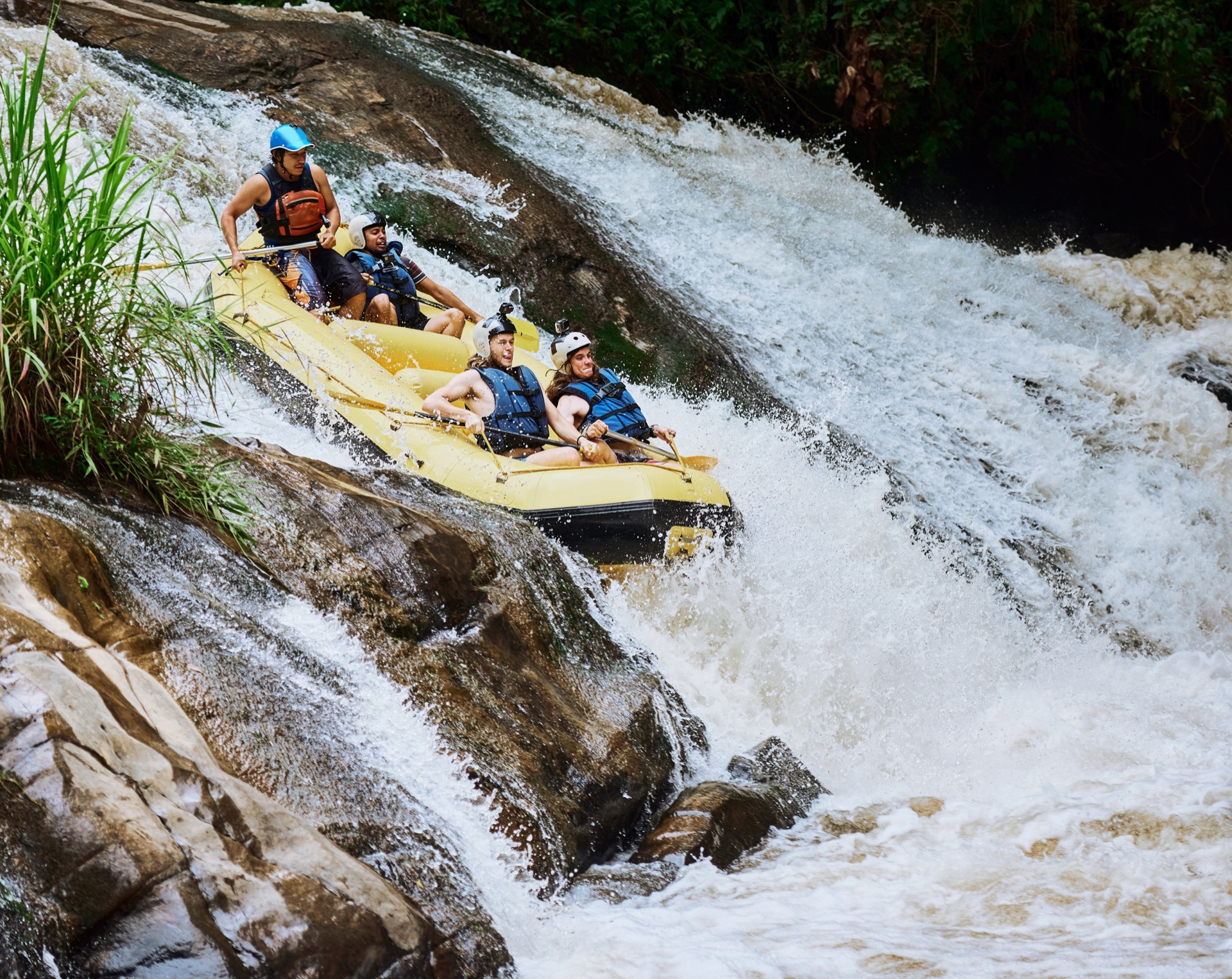 Team navigating white water rapids on African river